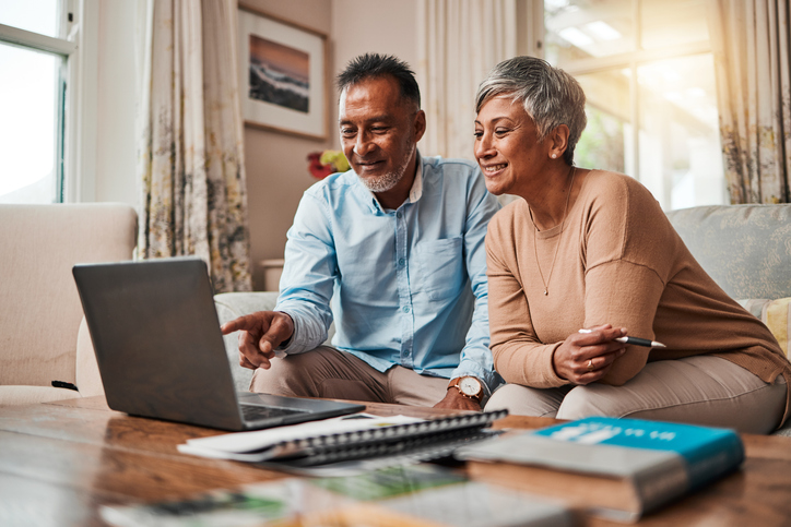 A couple reviewing their 401(k) plan.