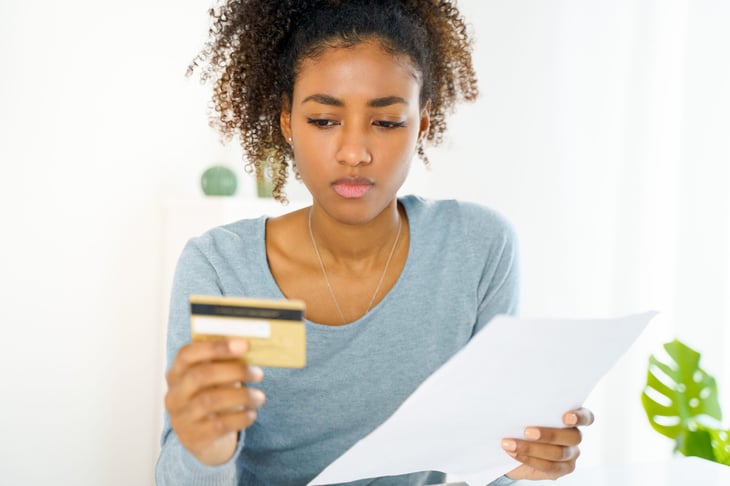 Woman looking at her credit report